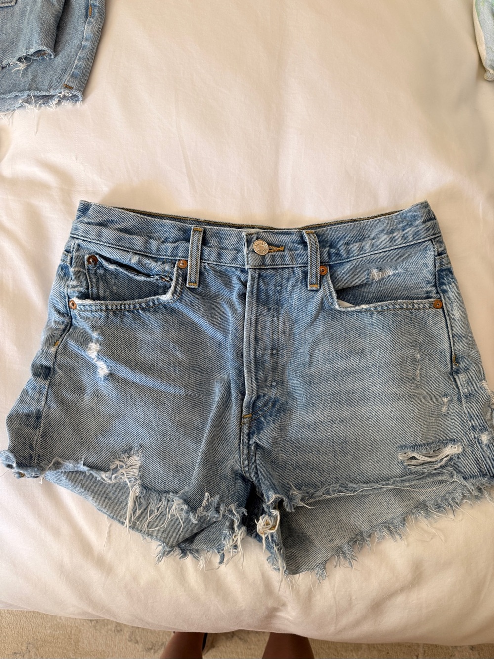 Agolde Light Blue Distressed Denim Cutoff Shorts